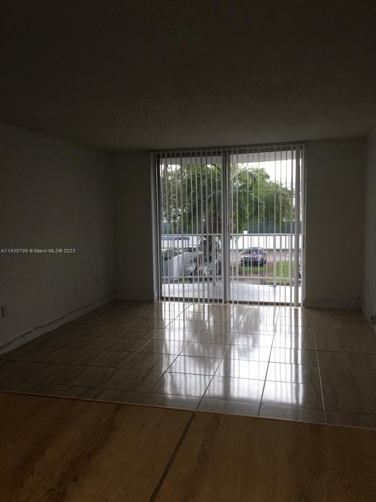498 NW 165th St Rd # D205, Miami FL 33169