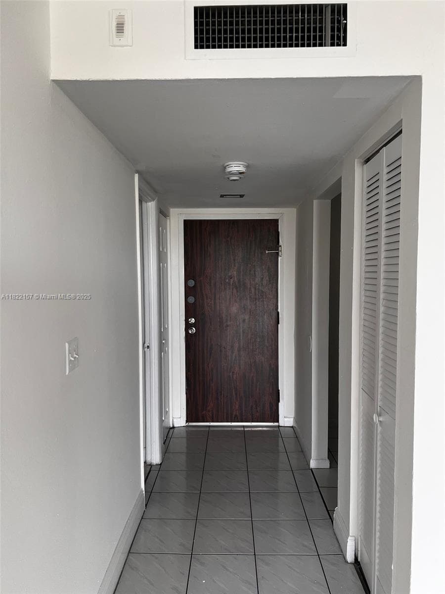 498 NW 165th St Rd # D303, Miami FL 33169