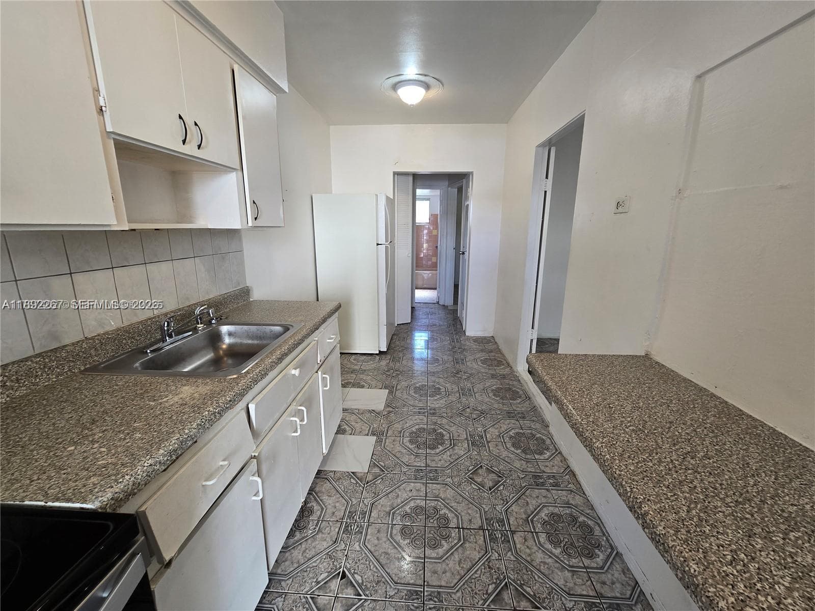70 NW 77th St # 11, Miami FL 33150