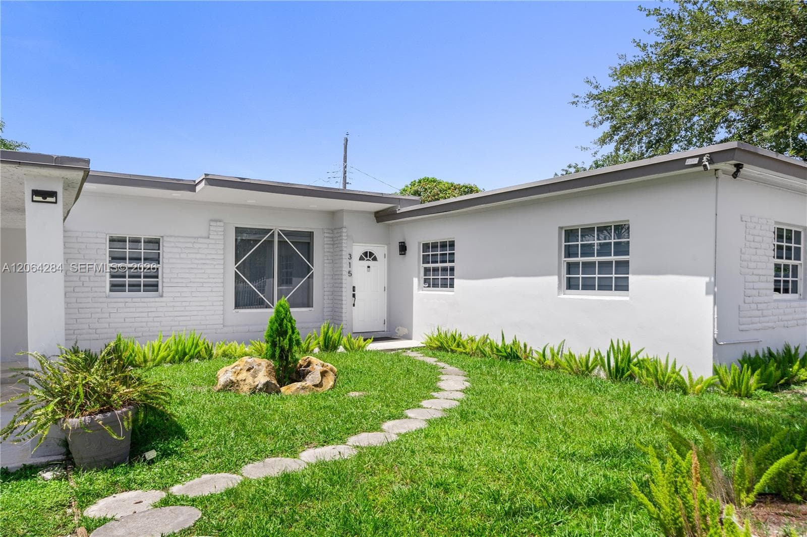 315 NW 106th ST, Miami FL 33150