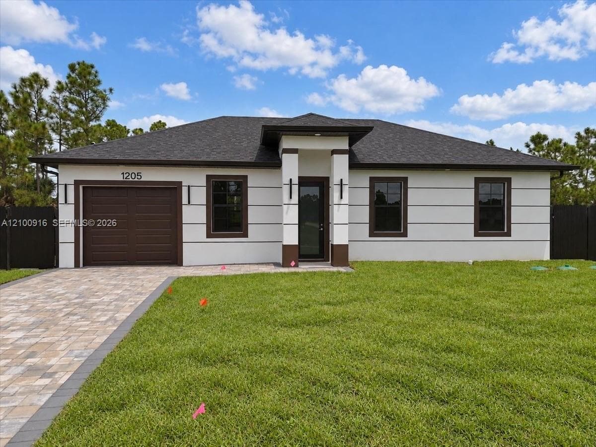 1205 Damen St E, Lehigh Acres FL 33974