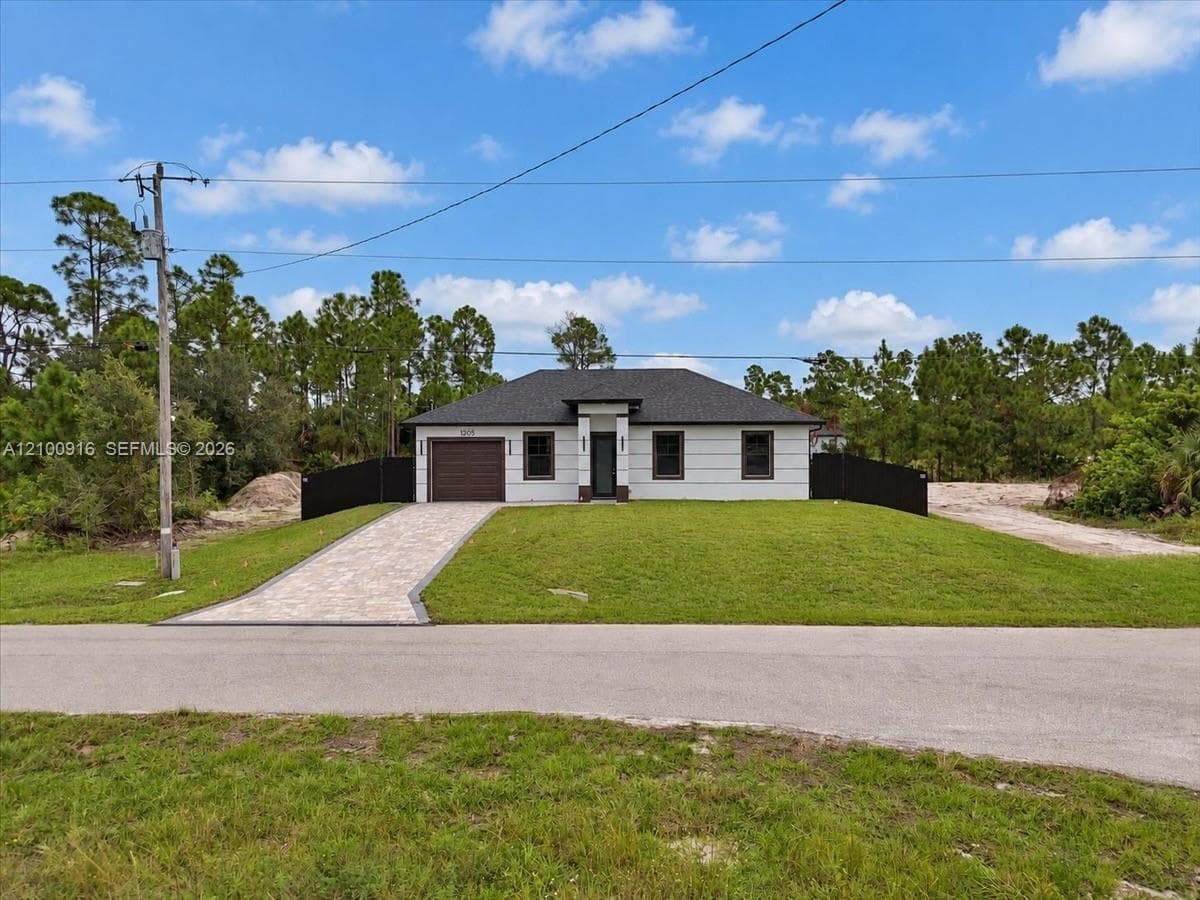 1205 Damen St E, Lehigh Acres FL 33974