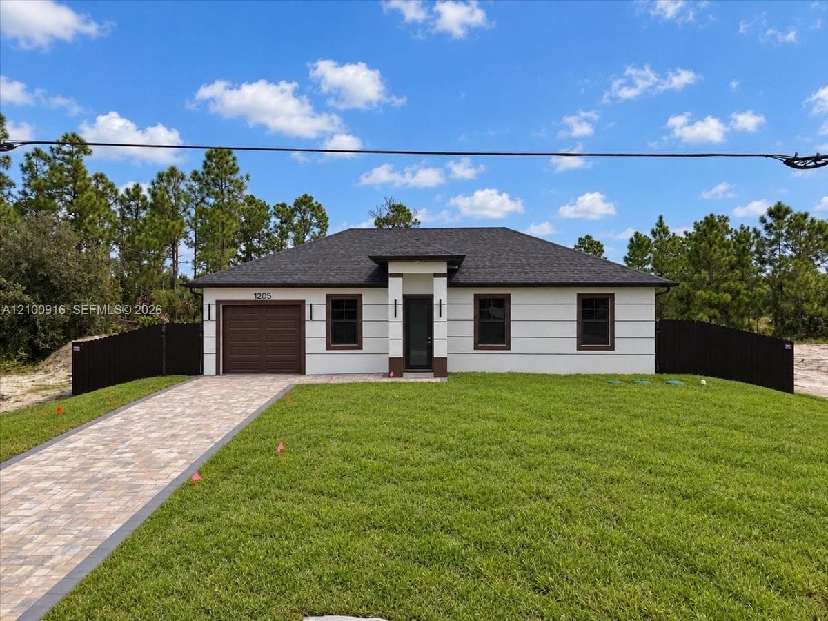 1205 Damen St E, Lehigh Acres FL 33974