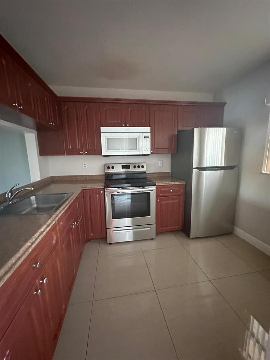 9157 NW 1ST Court # 203, Pembroke Pines FL 33024