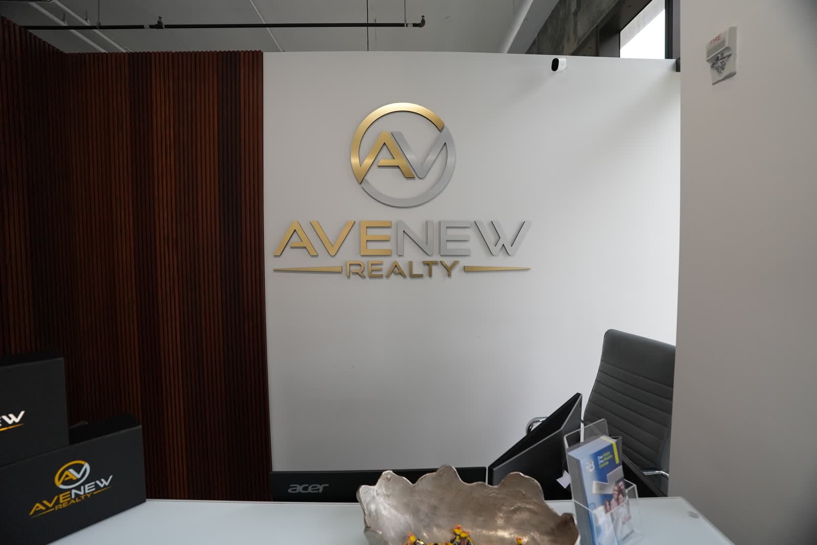 Avenew reception with the gold logo