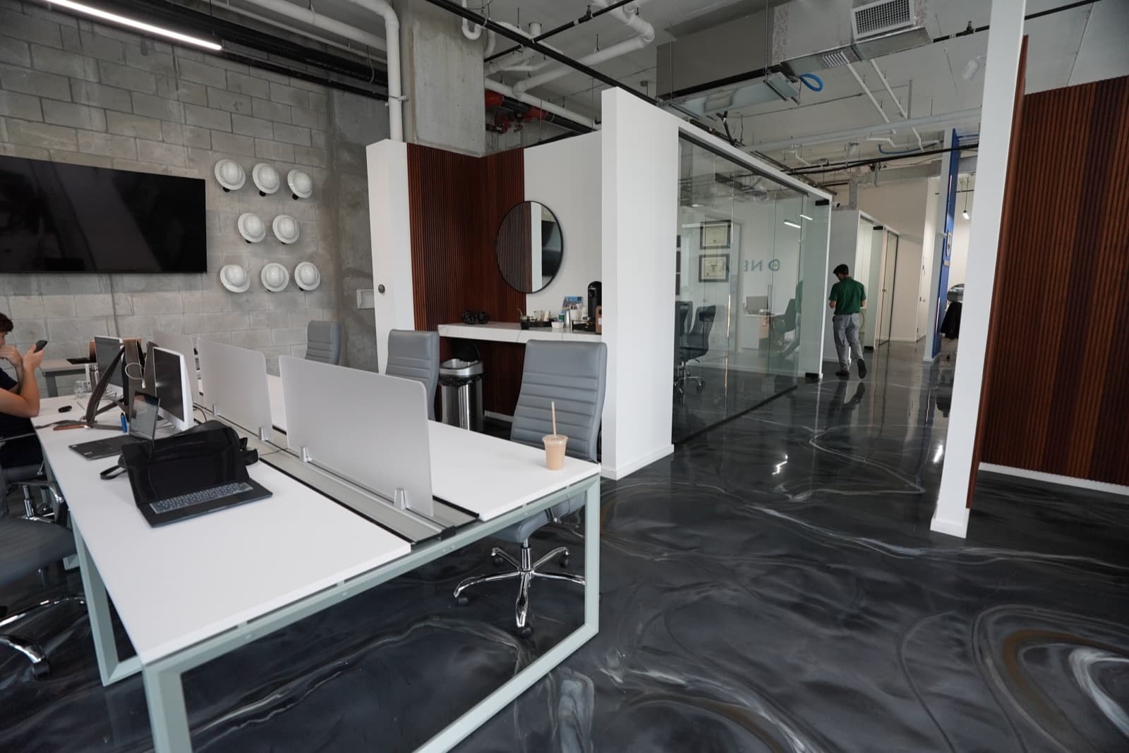 Workstations beside the reception at the Brickell office