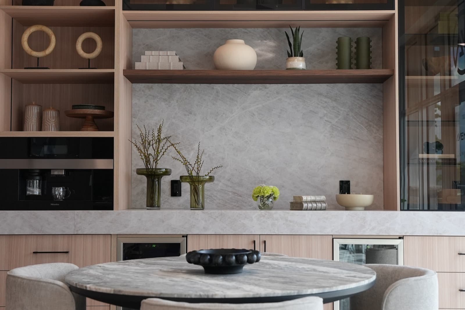 Lounge shelving and coffee station at the Doral office