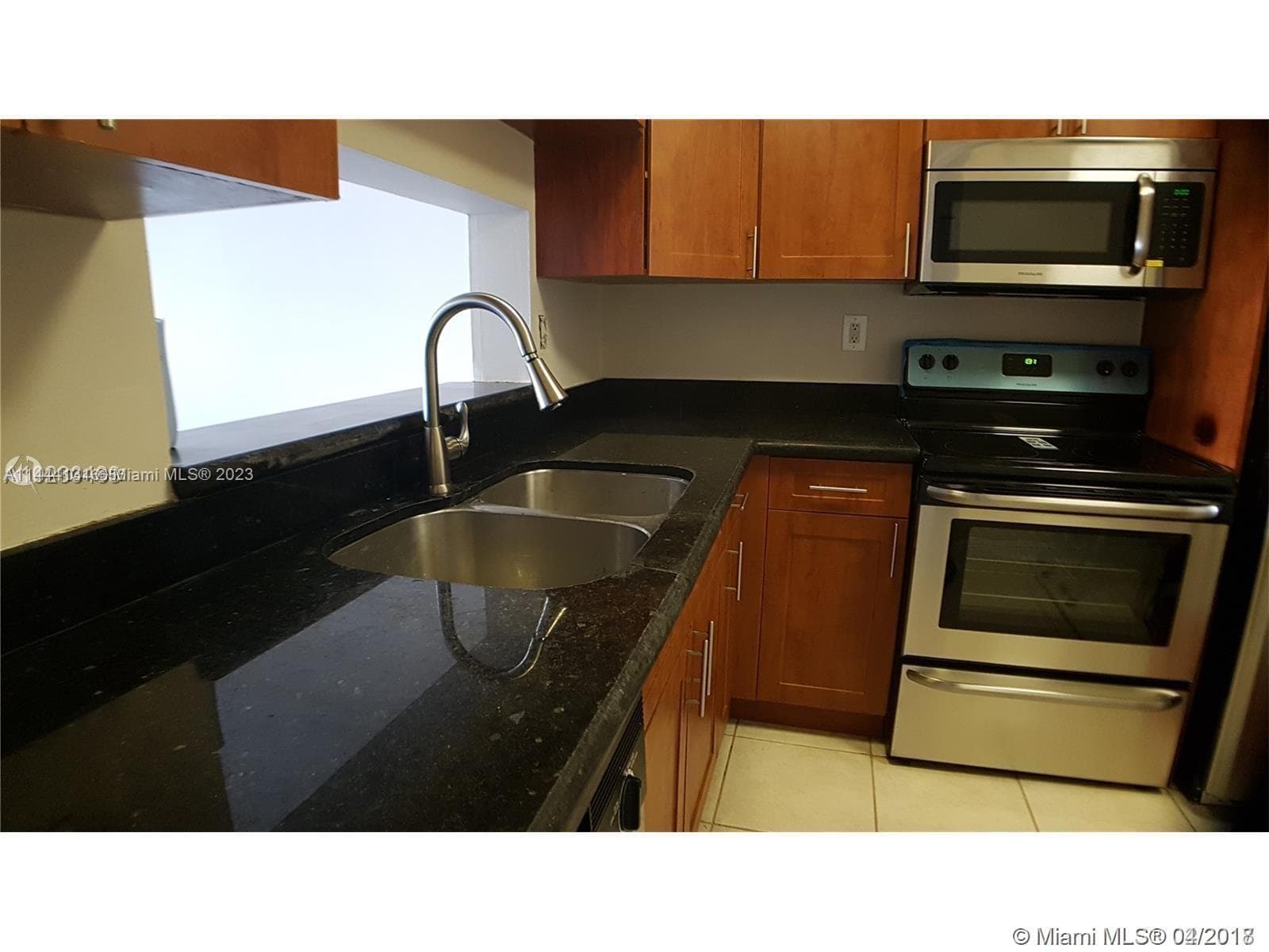 496 NW 165th St Rd # D112, Miami FL 33169