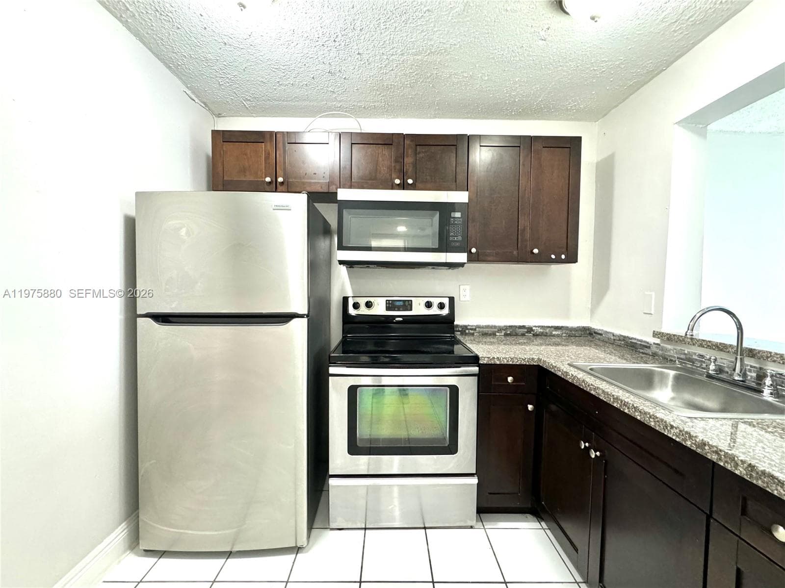 484 NW 165th St Rd # 411, Miami FL 33169
