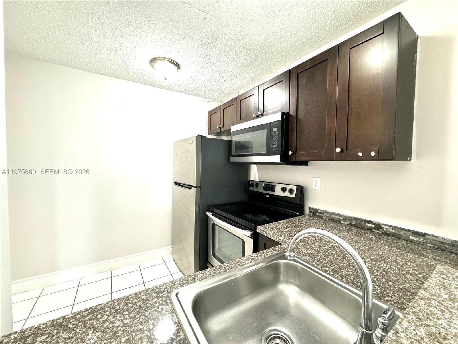 484 NW 165th St Rd # 411, Miami FL 33169