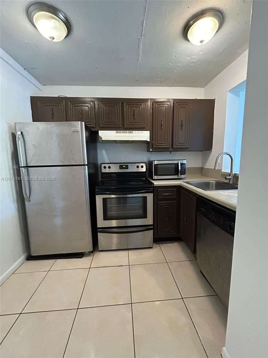 496 NW 165th St Rd # 310, Miami FL 33169