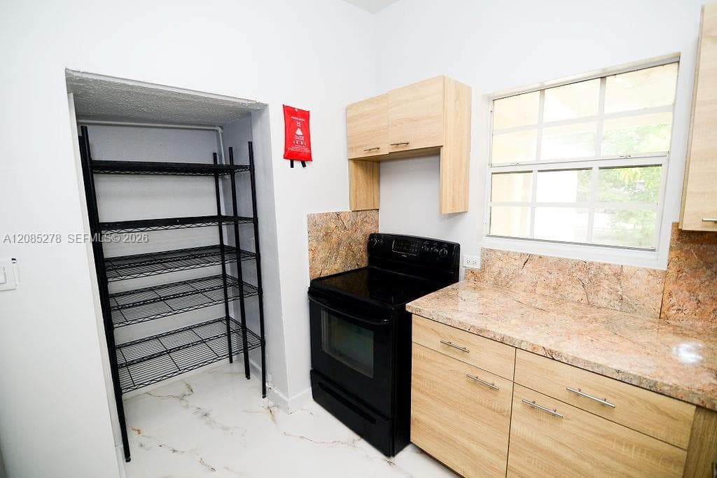 298 NW 104th St, Miami FL 33150