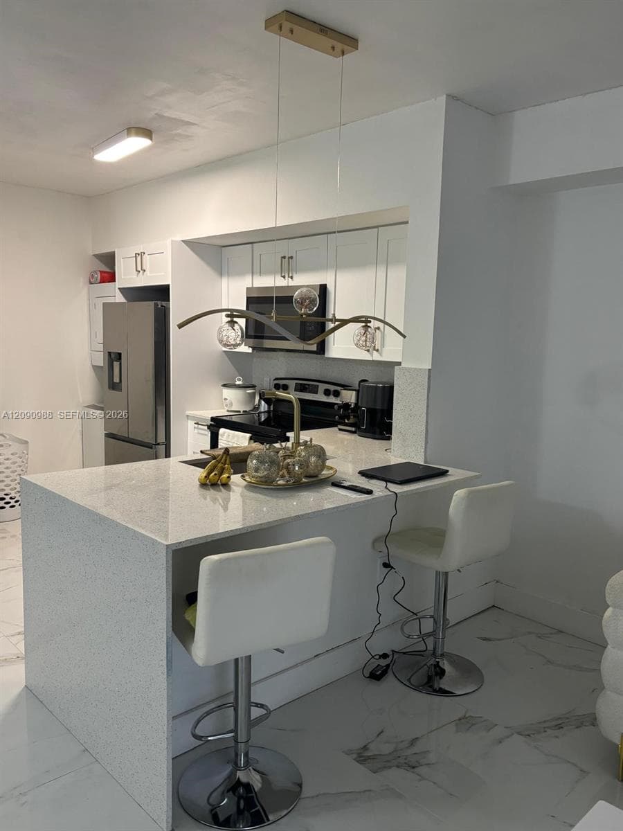 5077 NW 7th St # 912, Miami FL 33126