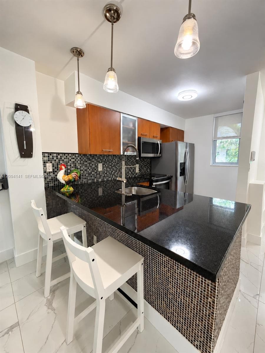680 NE 64th St # A501, Miami FL 33138