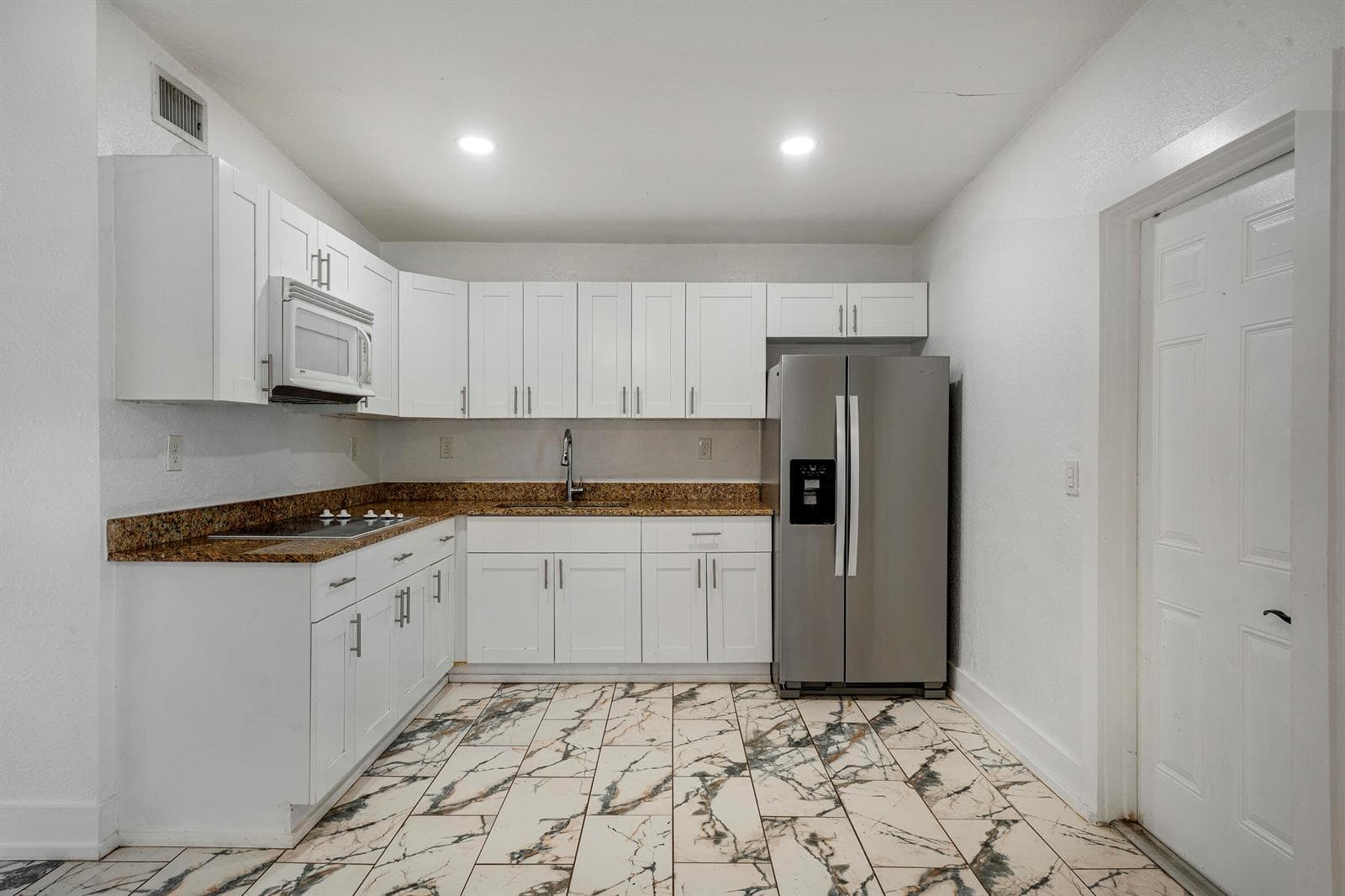 130 PLUM TREE Drive, Lake Worth FL 33462