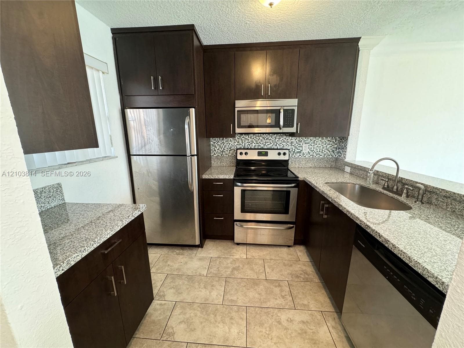 365 NE 125th St # 401, North Miami FL 33161